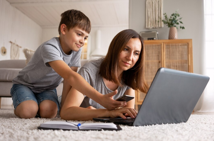 Woman shopping with her son online