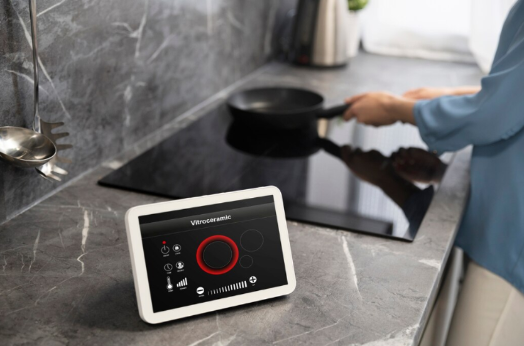 Person using smart technology in kitchen while cooking