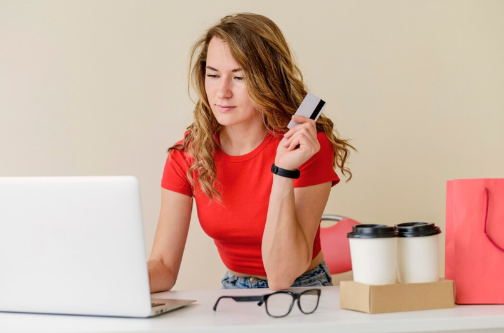 Woman shopping online using price comparison tools