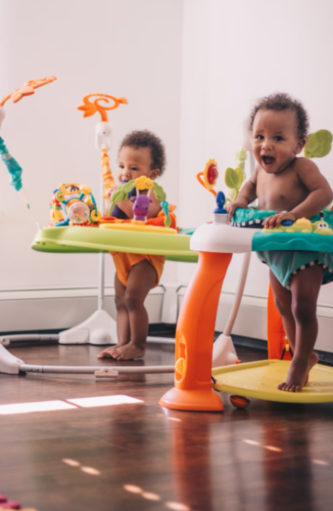 Two children in a playroom.
