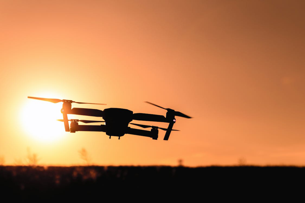 Silhouette of a drone at sunset