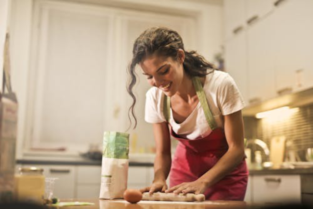 A person cooking in their kitchen
