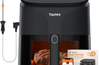 Smart black air fryer with digital controls, meat probe, and cookbook displayed