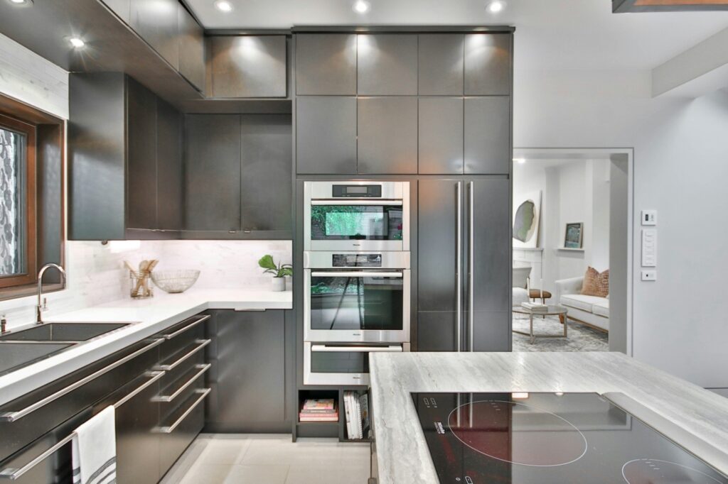 a modern kitchen with sleek steel design