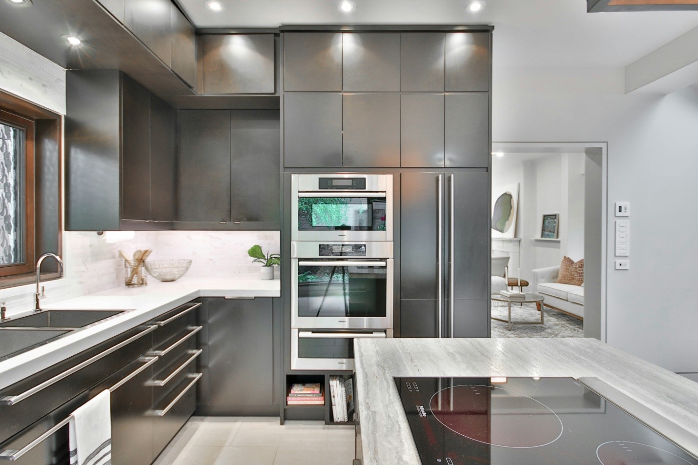 a modern kitchen with sleek steel design